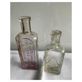 2 Vtg bottles- Foutzï¿½s Liniment & Grand Union
