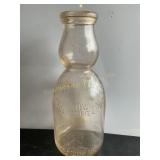 Superior dairy qt. Cream top milk bottle.