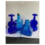 4 blue bottles, Wheaton, etc tallest 8 1/4"