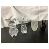 4  rabbit paperweights, largest is 4"H
