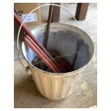 Horseshoes in metal bucket