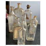 8 clear glass bottles, Sloans, Vapo-Cresolene c