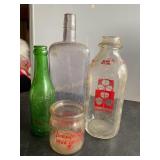4 glass bottles, Cloverland milk, Pensupreme s