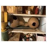 Contents of one shelf- bug catcher, bait bucket,