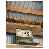 Contents of shelf- 3 wooden stools & tip sign