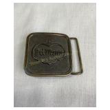 Del Monte brass belt buckle, 2x2"