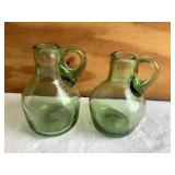 to hand blown green glass jugs, tallest is 5.75"