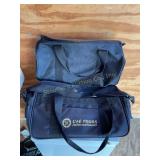 2 Black duffles bags, largest is 16x9"