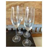 4 Stemmed clear glass champagne glasses, 9"