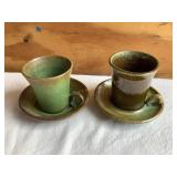 2 Pottery cups & saucers