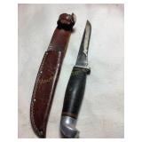 Hunting knife & sheath, 4" blade, USA, shows wear