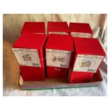 12 Sally Huss collectible ornaments