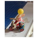 Tin metal wind up Easter bunny on tricycle (made