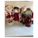Santas and caroler 18" tallest