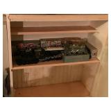 Content of one shelf - Avon bottles - railroad