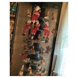 Santaï¿½s only in display case & items on top