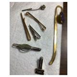 Tie bars, clip, Montgomery Co. brass book mark-