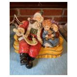 Ceramic Santa on couch, 10" x 8ï¿½