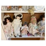 5 porcelain dolls, 14" tallest