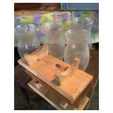 4 glass globes w/ wood stands largest 12"l