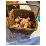 Basket of plastic baby dolls