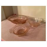 Pink sandwich ware dishes- bowls, largest is 9"