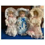 3 Porcelain dolls , 14"