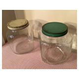 2 Vtg glass canister jars, largest is  7"