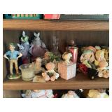Shelf lot- figurines, candles, dolls, rabbits,