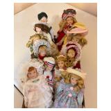 8+ porcelain dolls, 8" tall