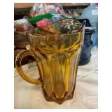 Amber glass pitcher 9" tall