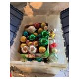 Plastic tote with Christmas ornaments