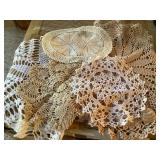 10+ doilies - largest 16"d