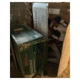 Snowman snow, gauge, and revolving tree stand