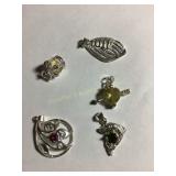 5 Small pendants, most marked 925, .31 oz.
