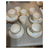 8 Anchor hocking cups & saucers