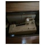 Kenmore, sewing machine in wood cabinet, file