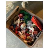 Plastic tote with Christmas ornaments