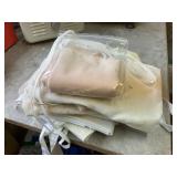 8 butchering aprons, some show wear