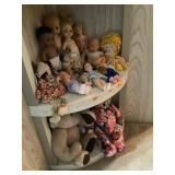Contents of 2 shelves, dolls, plush, etc.