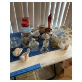 Misc glassware, mugs, sugar, creamer, doves, etc