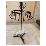 Black metal rotating jewelry stand 16.5"H