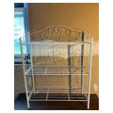 Metal shelving unit, 23x309.5"