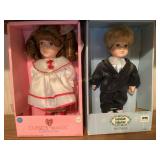 2 Collectible porcelain dolls, cupids magic,