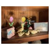 Contents of shelf- Easter decor, ceramic ducks,