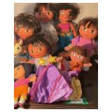 8 Dora the explorer dolls  15" tallest