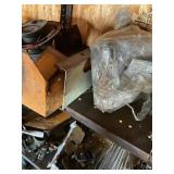 Contents of 2 shelves, welding irons, used auto