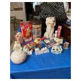 Misc figurines, playing cards, rolling bag cart