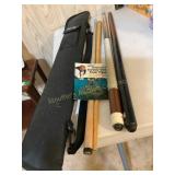Pool cues, tips, Spalding carry bag