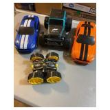 4 battery powered cars, mustangs, jeep, etc  12"